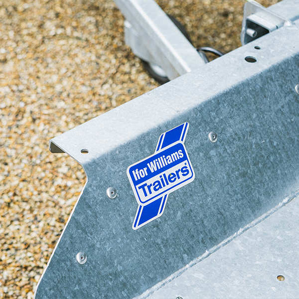 UK Towing Laws Explained infographic showing licence rules, trailer weight flow, and down-plating myth